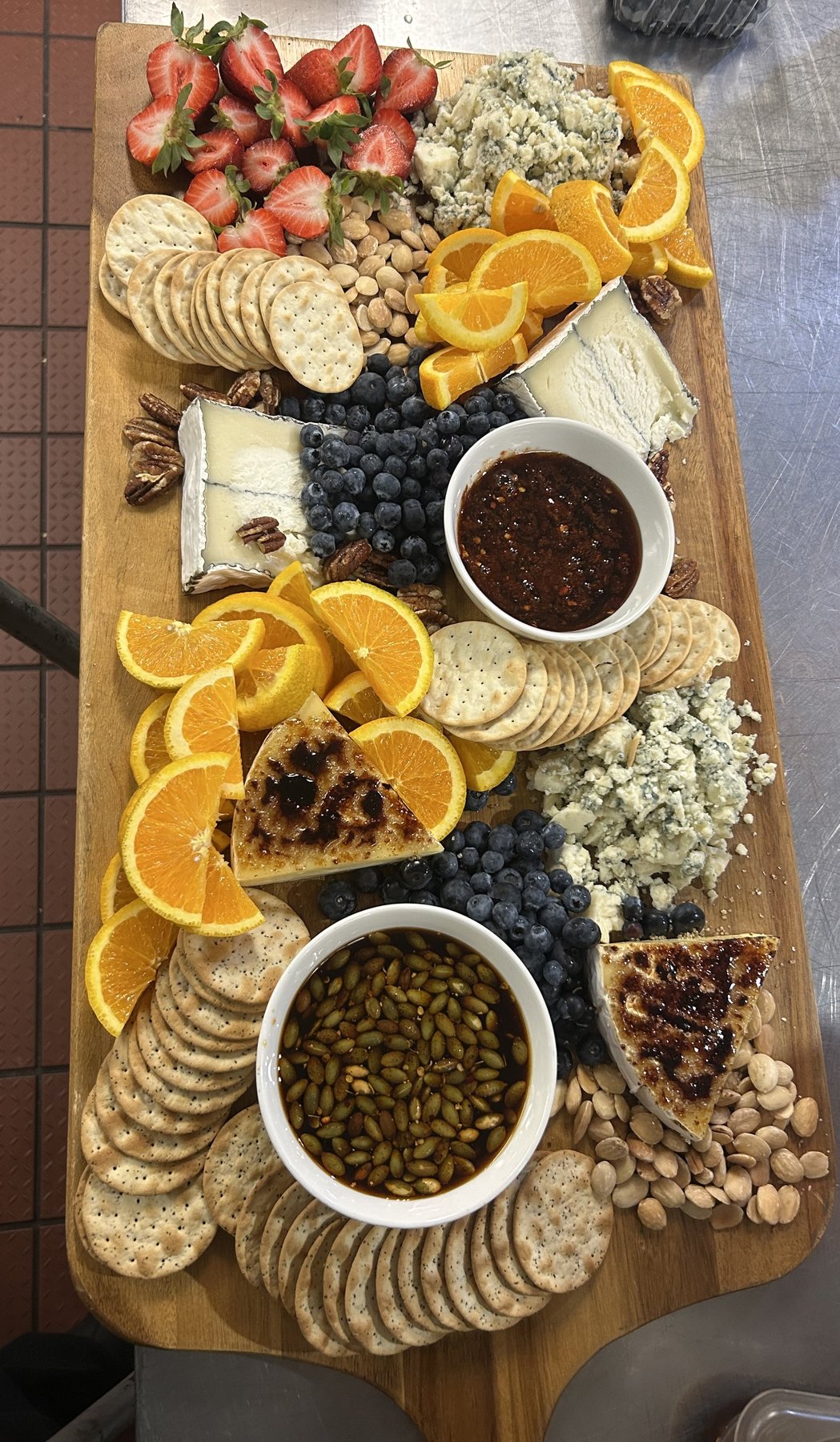 Artisan cheese and fruit board catered by Oakmont
