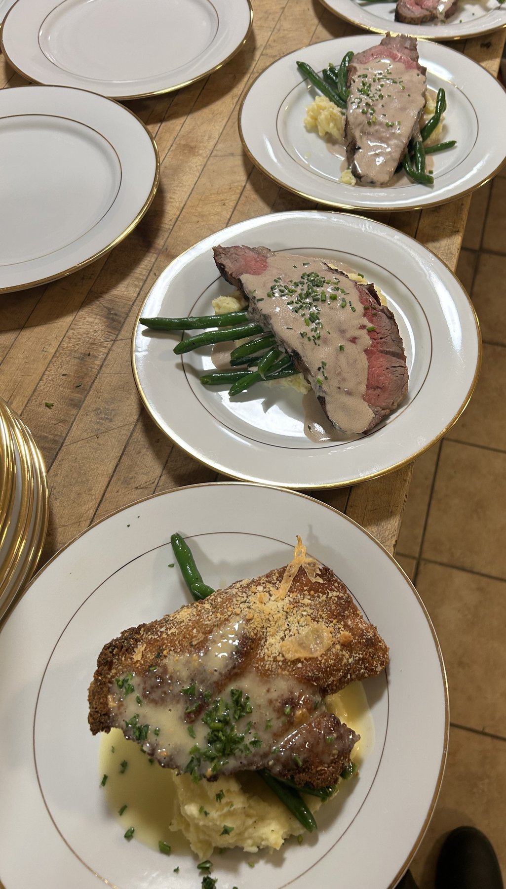 Plated steak dinner service for a formal Oakmont event